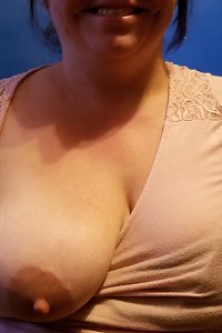 lush doll with a passionate expression, slurping her fingers